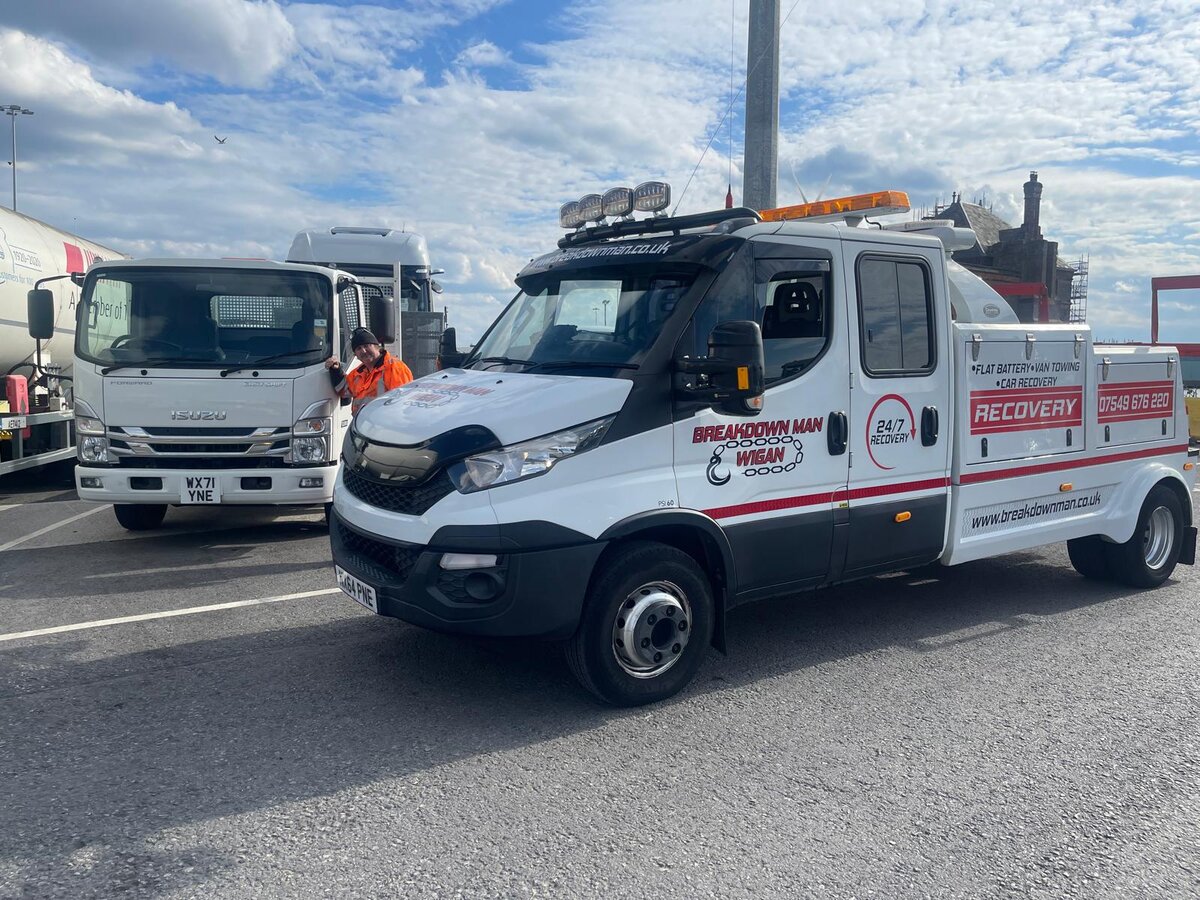 Breakdown Man's branded white Iveco recovery truck parked at the Wigan depot.